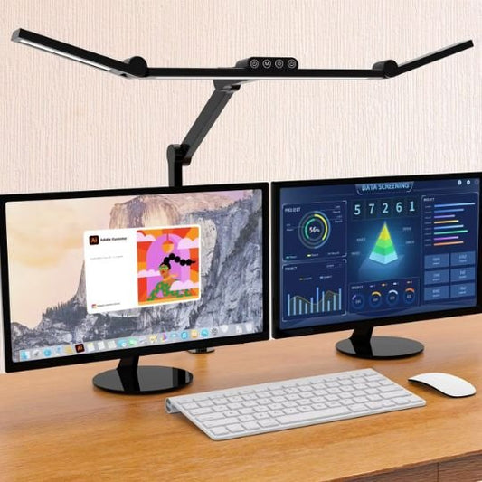 Lampes de bureau éclairent deux écrans d'ordinateur